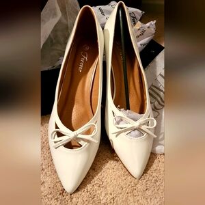 White faux patent leather heel